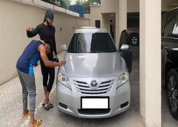 Nigerian singer, Flavour shocks childhood friend with car gift