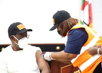 Okowa leads others to receive COVID-19 vaccine in Delta