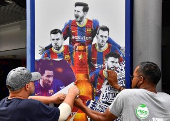 Messi signs for PSG, photo removed from Barcelona’s stadium