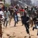 Cultists resort to burning rival cultist as machete, bullets failed to harm him